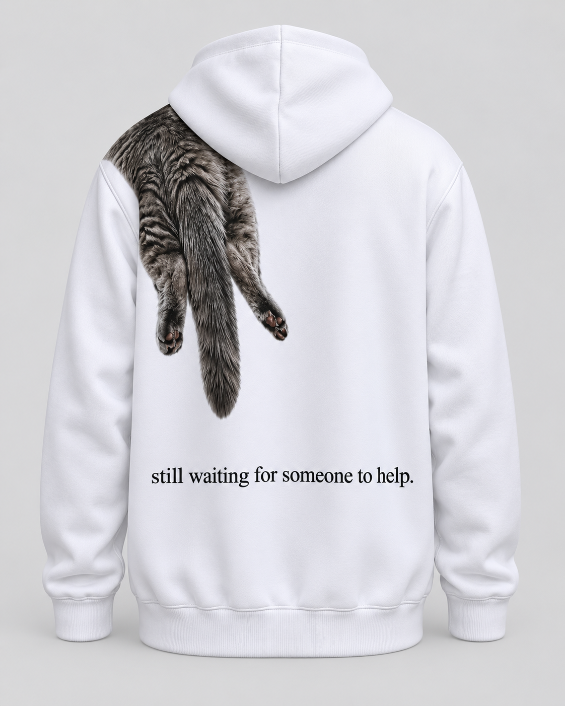 Back view of white VZAEMOA graphic hoodie with grey cat draped over the shoulder and playful back text